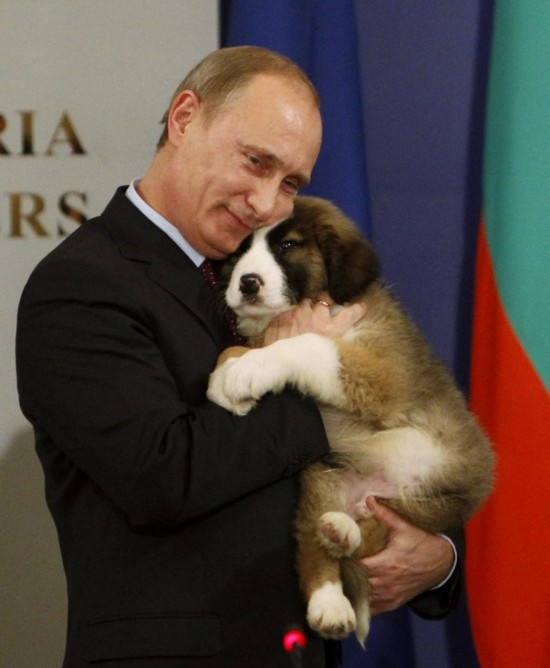 156606-russias-prime-minister-putin-hugs-a-bulgarian-shepherd-dog-after-recei