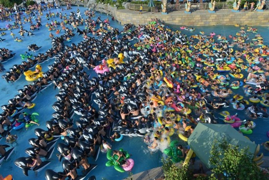 PAY-People-Crowd-At-Water-Park