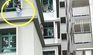 【動画】3階の窓の外に立っていた小さな子を通りすがりの青年が助ける。